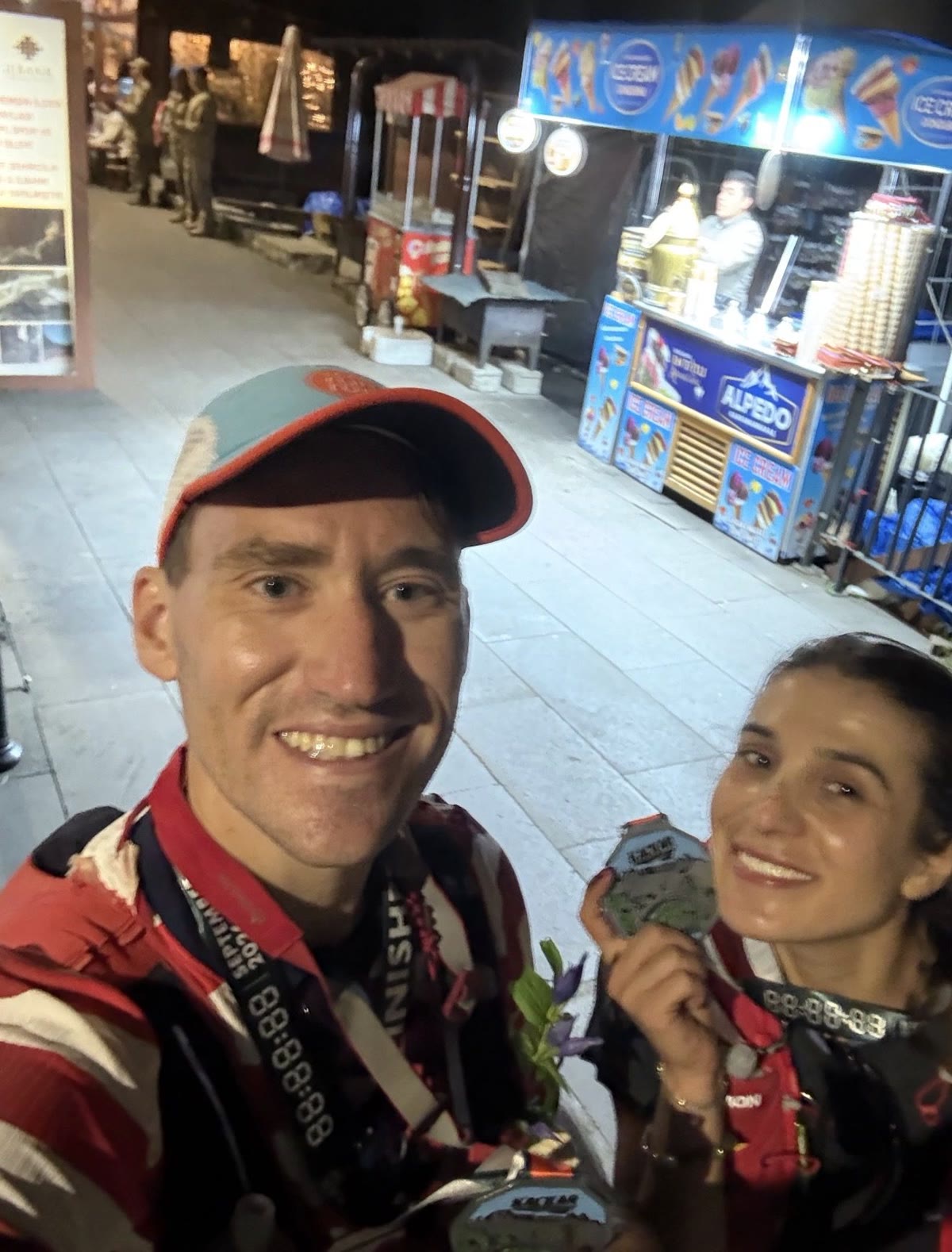 Zach and Tenzile with finisher medals after the Kaçkar 50K